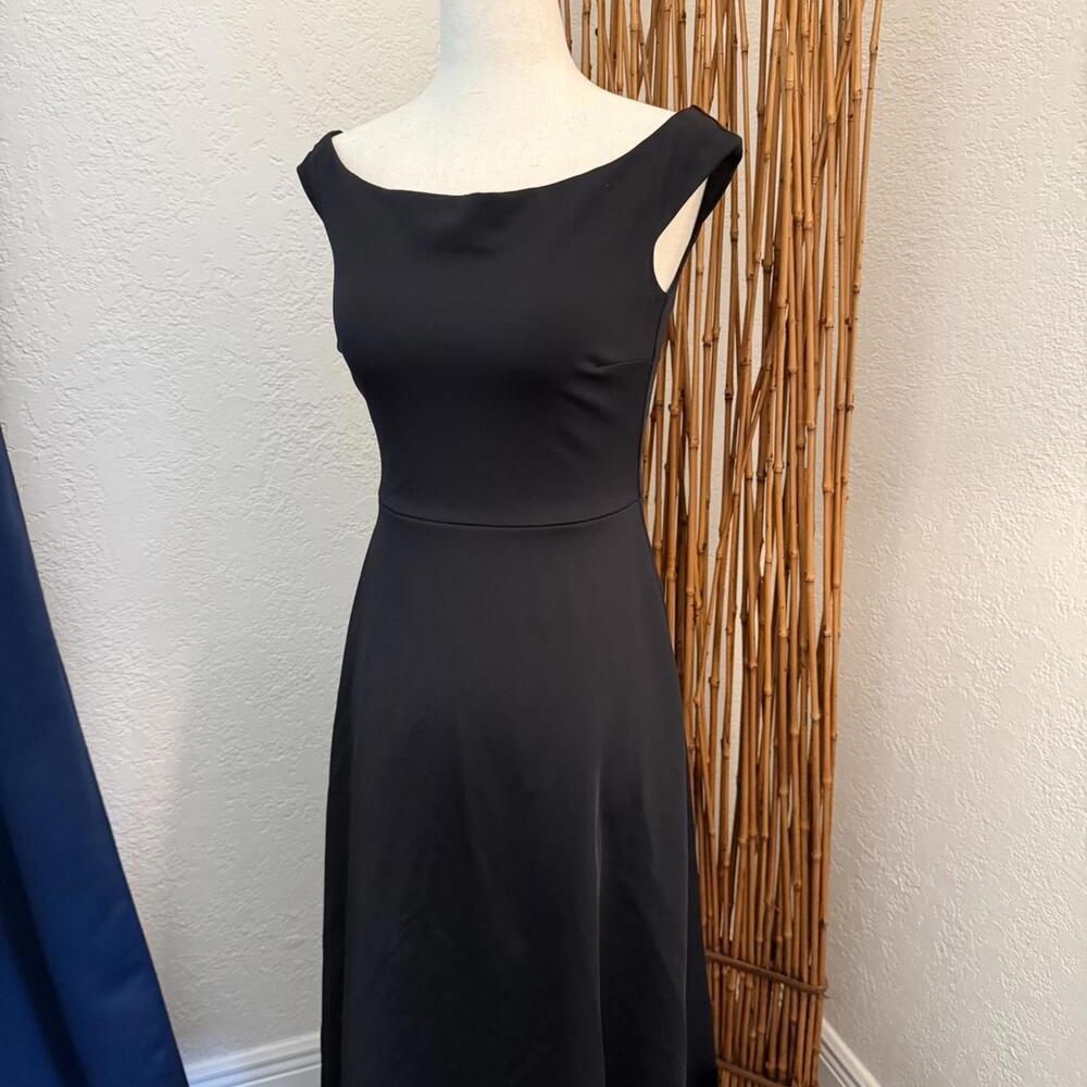 Black Trina Turk scuba dress with a fitted silhouette #LBD #midi